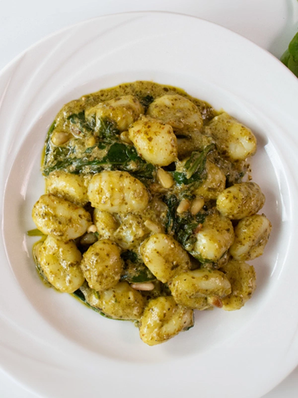 CREAMY PESTO GNOCCHI WITH TOASTED PINE NUTS