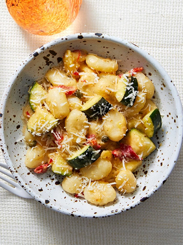 GNOCCHI & YELLOW TOMATO SAUCE WITH ZUCCHINI AND ROASTED RED PEPPERS