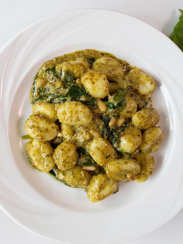 CREAMY PESTO GNOCCHI WITH TOASTED PINE NUTS