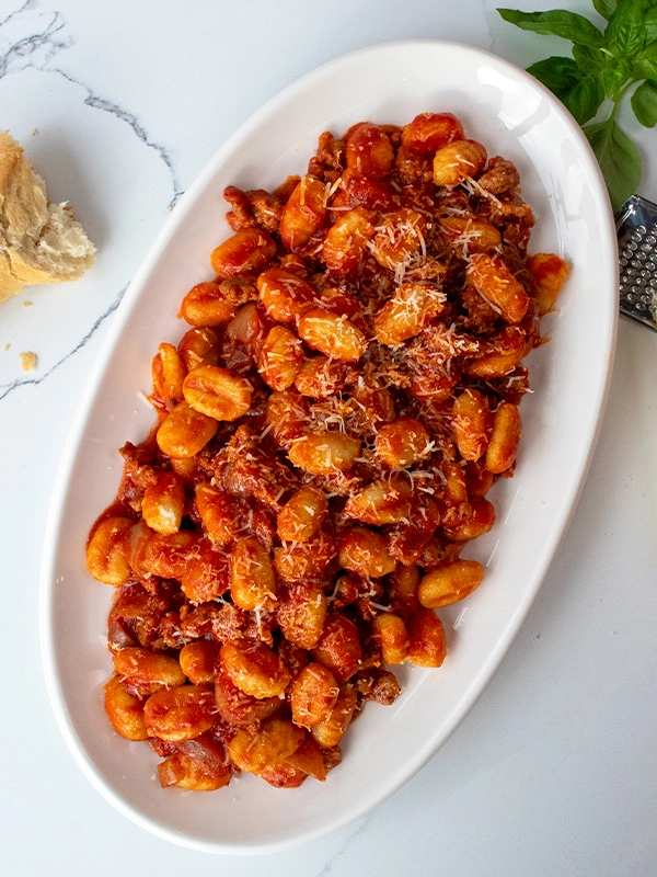 TUSCAN SAUSAGE RAGU OVER GNOCCHI