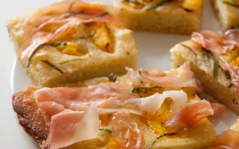 FLATBREAD WITH PEACHES, BASIL AND PROSCIUTTO