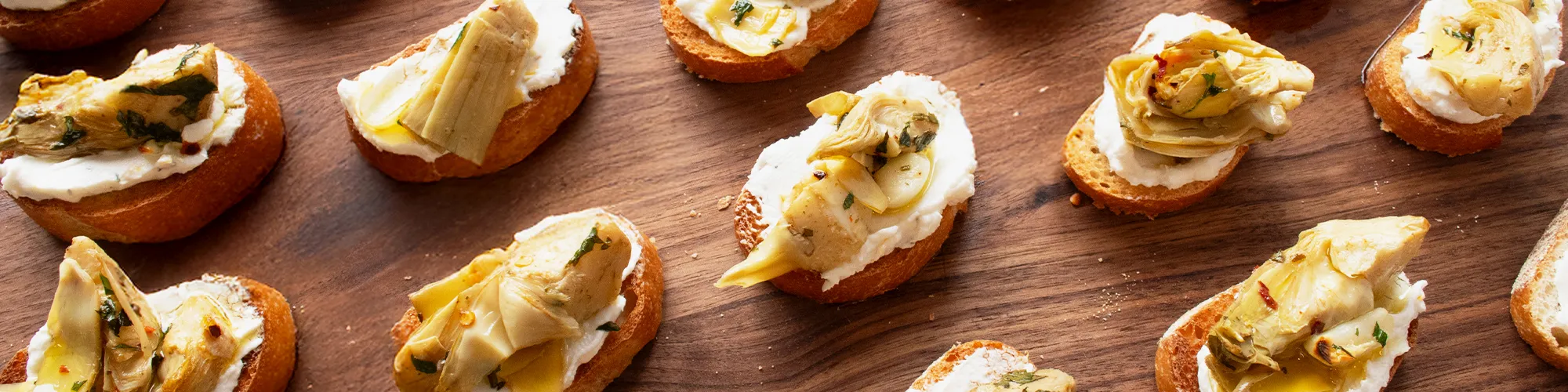 Roasted Artichokes & Goat Cheese Crostini