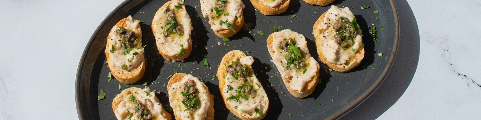 Cannellini Bean and Anchovy Gremolata Crostini