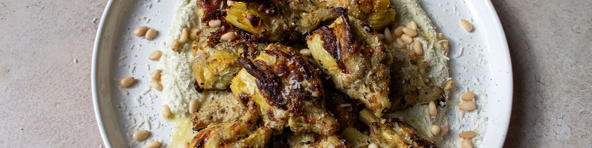 Crispy Smashed Artichokes with Pesto Whipped Ricotta