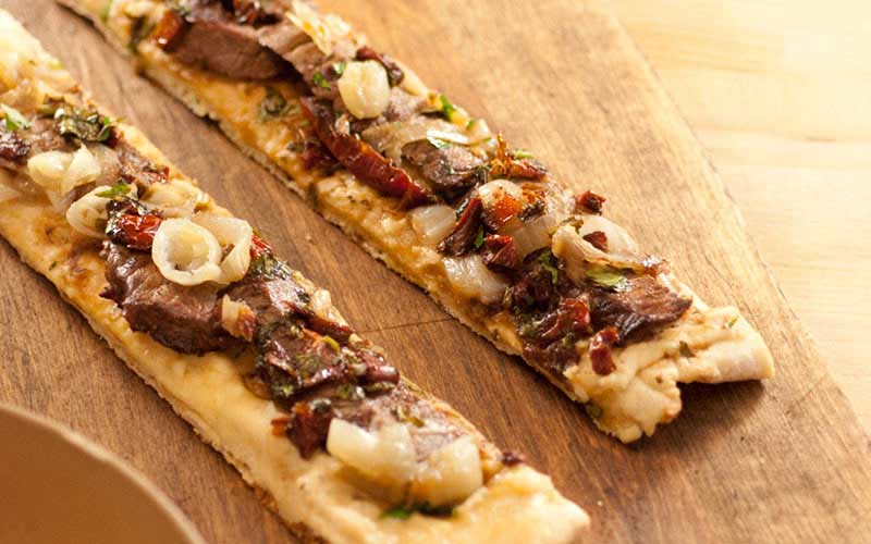 BEEF FILET & SUN DRIED TOMATO GRILLED FLATBREAD