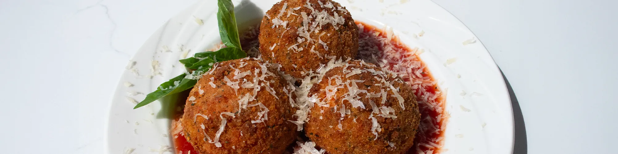 Tomato Arancini with Mozzarella & Basil