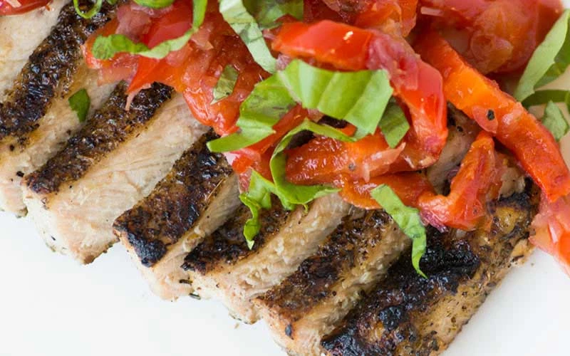 GRILLED PORK WITH MARINATED PEPPER STRIPS