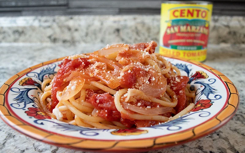 BUCATINI WITH PANCETTA, TOMATOES AND ONIONS