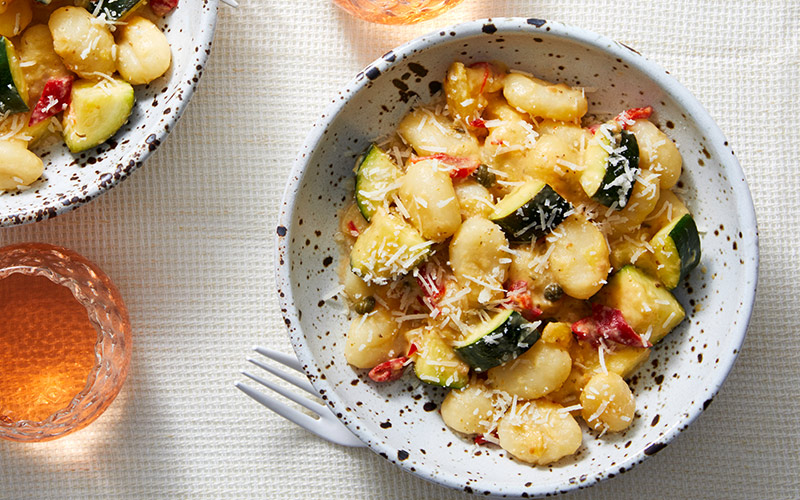 GNOCCHI & YELLOW TOMATO SAUCE WITH ZUCCHINI AND ROASTED RED PEPPERS