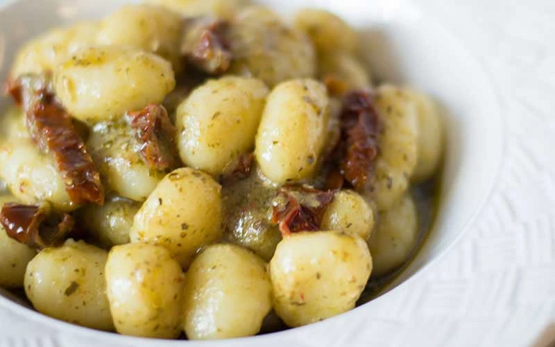 GNOCCHI WITH SUN DRIED TOMATOES & PESTO