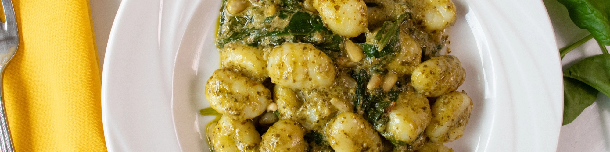 Creamy Pesto Gnocchi with Toasted Pine Nuts