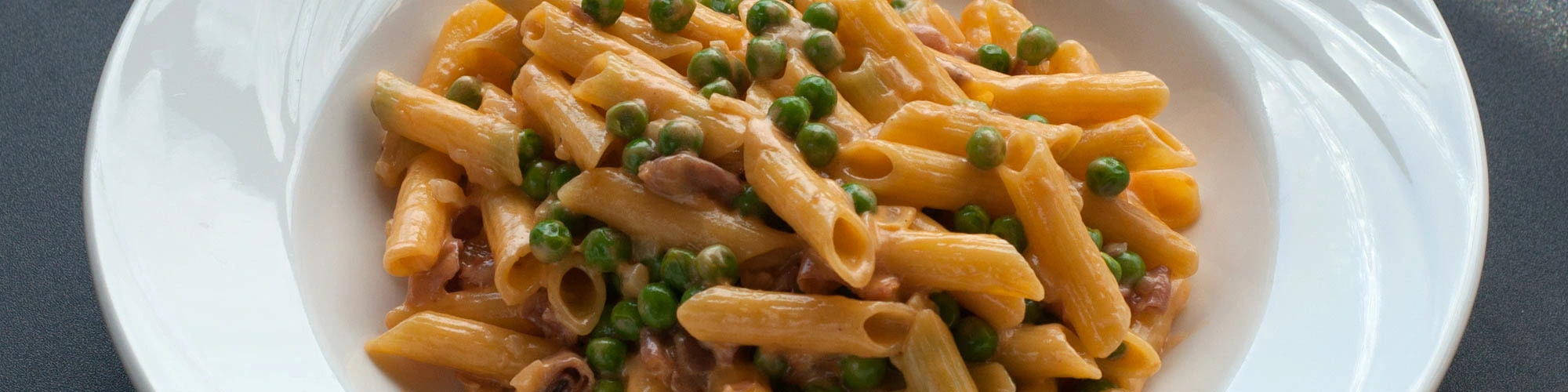 Gluten Free Penne with Peas, Prosciutto & Parmesan