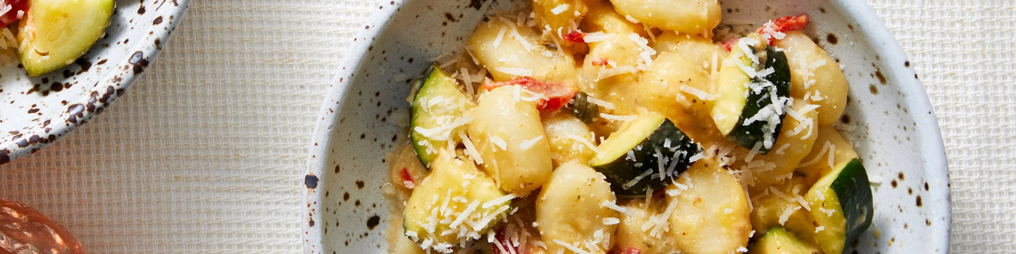 Gnocchi & Yellow Tomato Sauce with Zucchini and Roasted Red Peppers