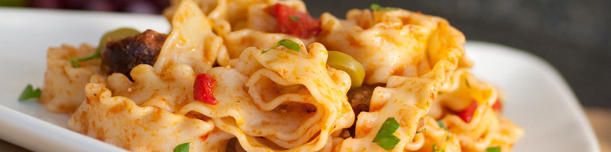 Mafaldine with Sausage & Roasted Peppers