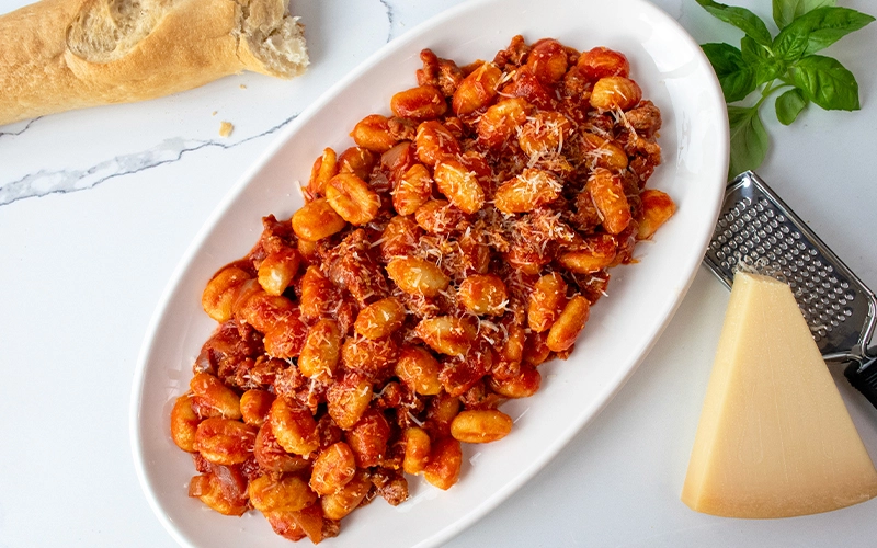 TUSCAN SAUSAGE RAGU OVER GNOCCHI