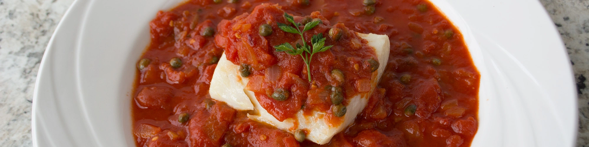 Poached Cod in Tomato Caper Sauce