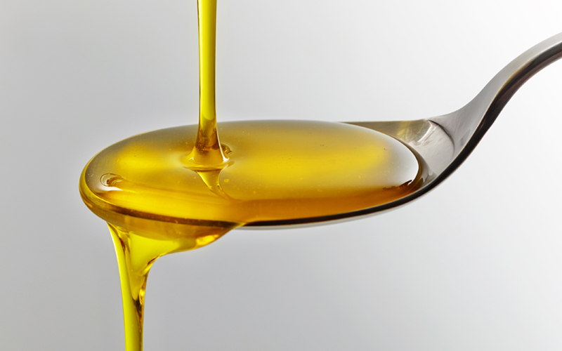 Olive oil on a spoon
