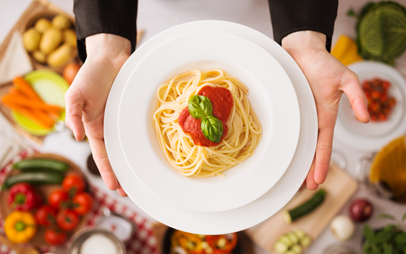 Holding Plate of Pasta