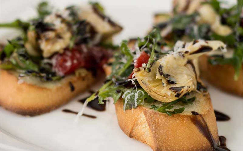 Artichoke Arugula Crostini