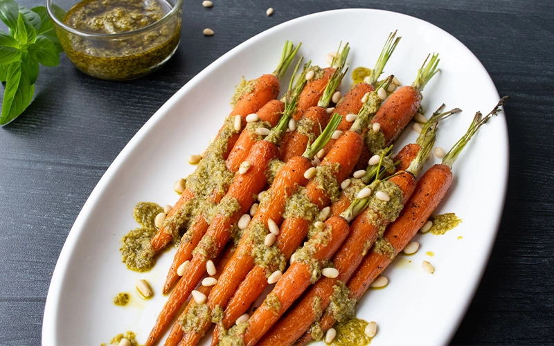 Roasted Carrots with Pesto and Pine Nuts